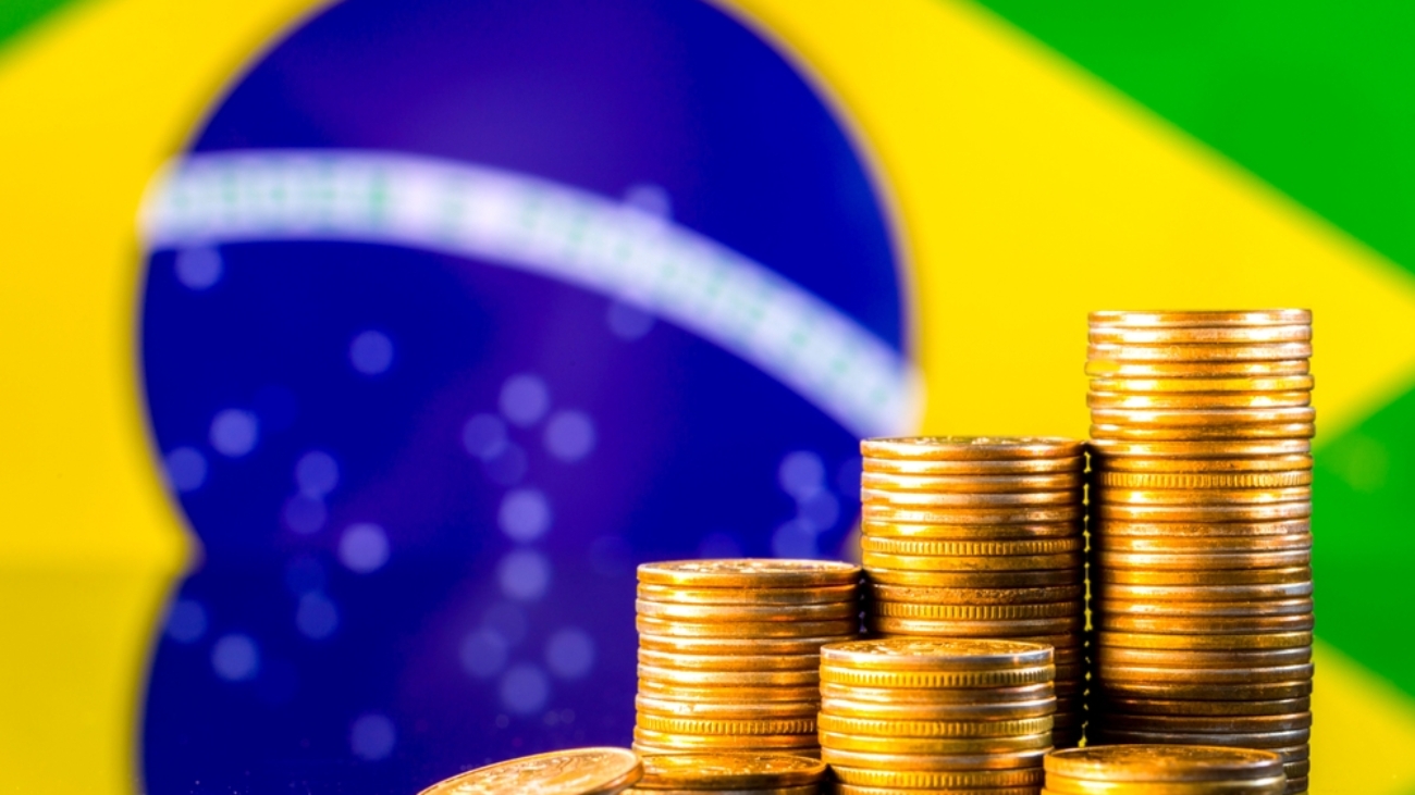 A,Stack,Of,Gold,Coins,On,The,Background,Of,The